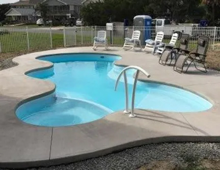 Able Pools and Spas installs the Daytona Beach San Juan pool, providing a luxurious swimming experience.