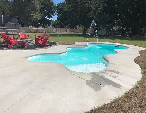 Able Pools and Spas installs the Crystal Cove San Juan fiberglass pool, offering a serene backyard retreat.