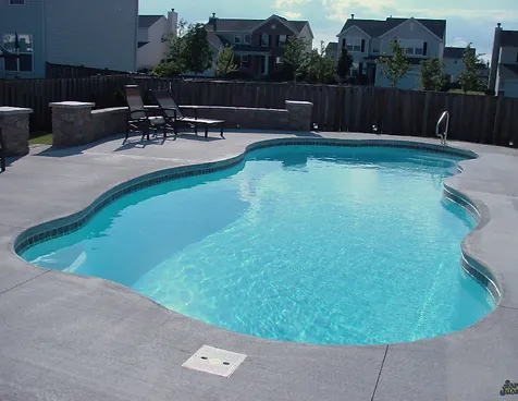 Able Pools and Spas enhances your backyard with the Oceanside San Juan fiberglass pool, offering a perfect retreat.